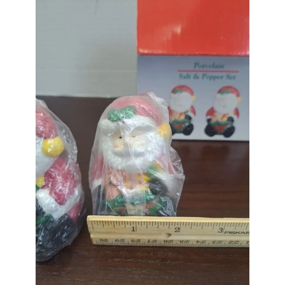 Set Of Porcelain Santa Salt And Pepper Shakers